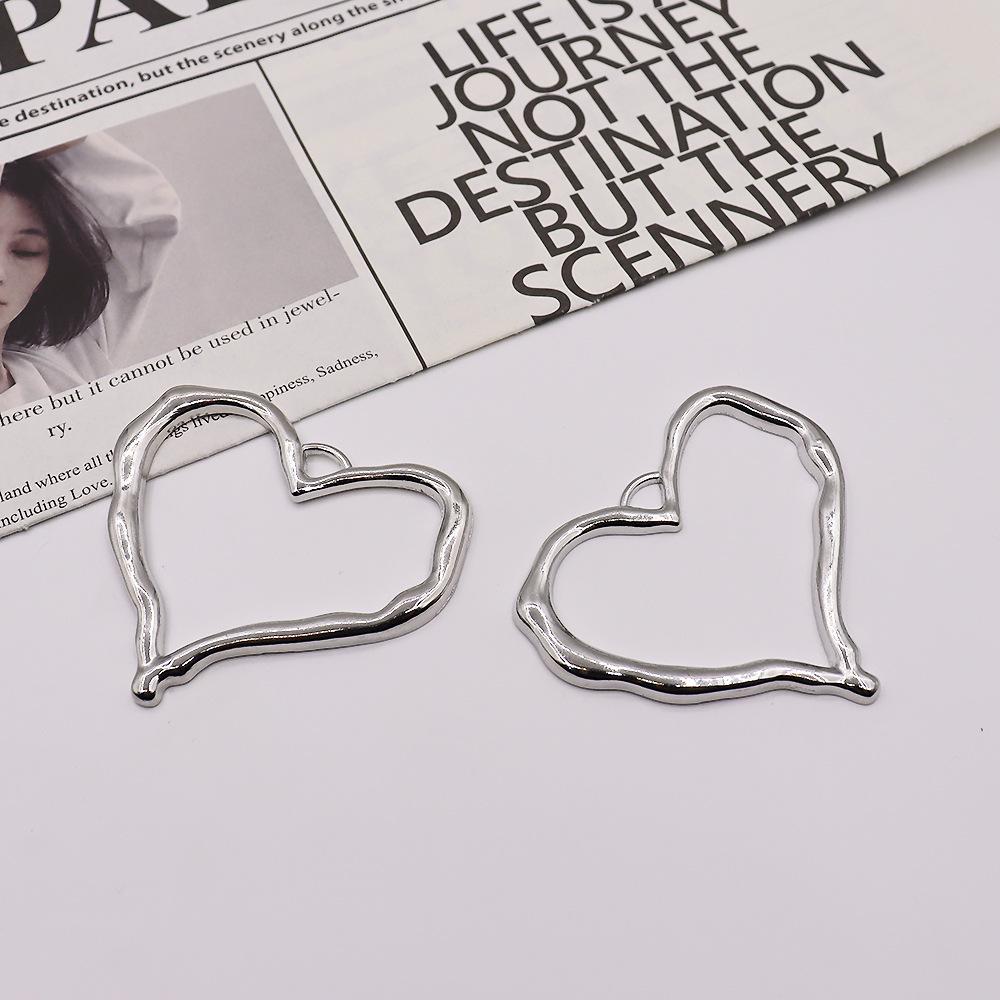 Cross-Border Love Pendant: Alloy Hollow Heart-Shaped DIY Jewelry and Earring Accessories