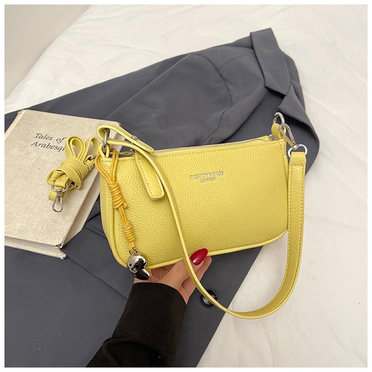 

2025 spring and summer Korean simple casual women commuter underarm bag fashionable versatile high sense solid color messenger bag