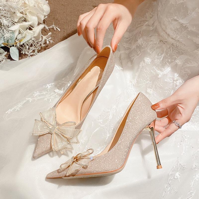 Spring and summer new champagne bow high heels women's pointed head shallow mouth crystal stiletto bridal wedding shoes