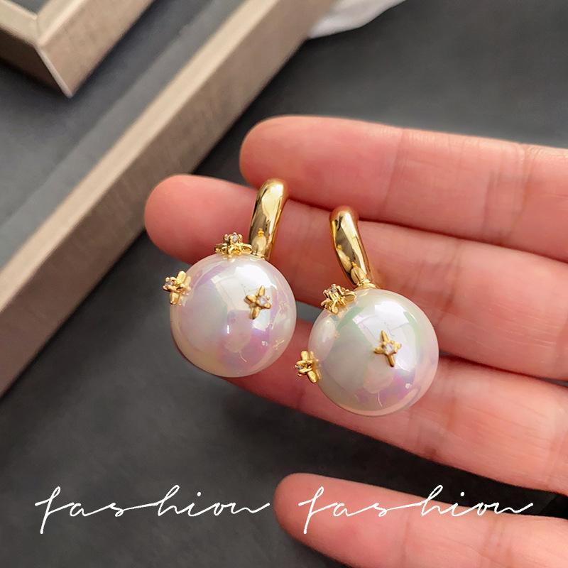 

Sterling silver needle star light pink colorful pearl stud earrings women s light luxury niche high-end temperament A-grade zircon ear jewelry