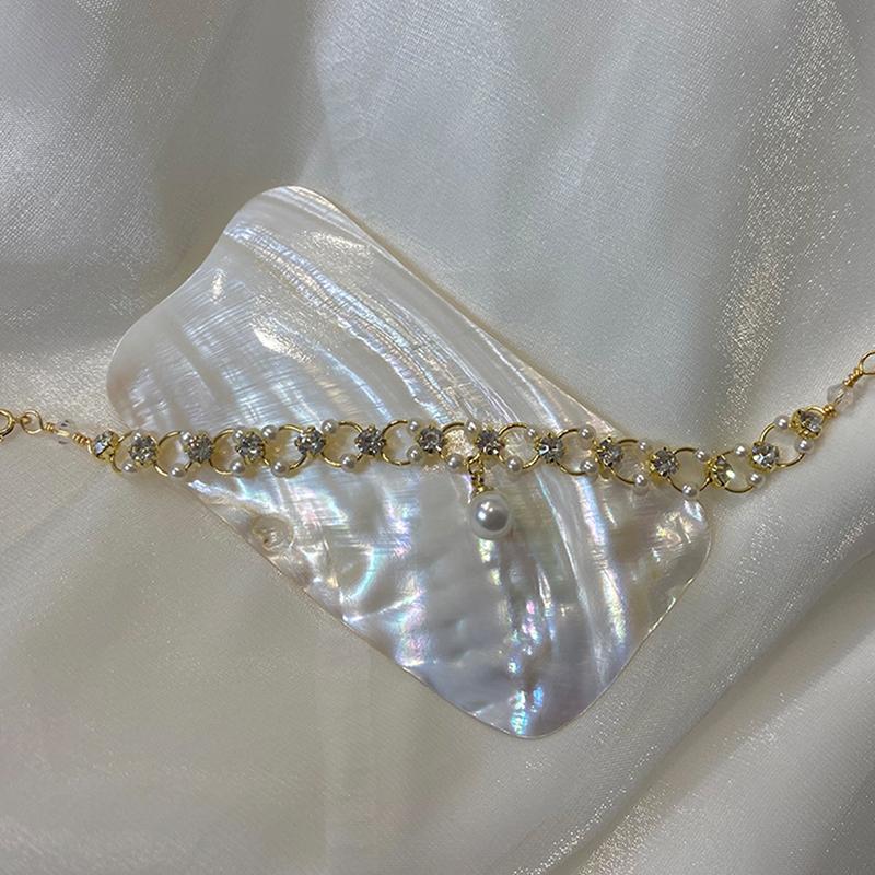 

Sweet Romantic Pearl Crossed Gold Colour Bracelet Set