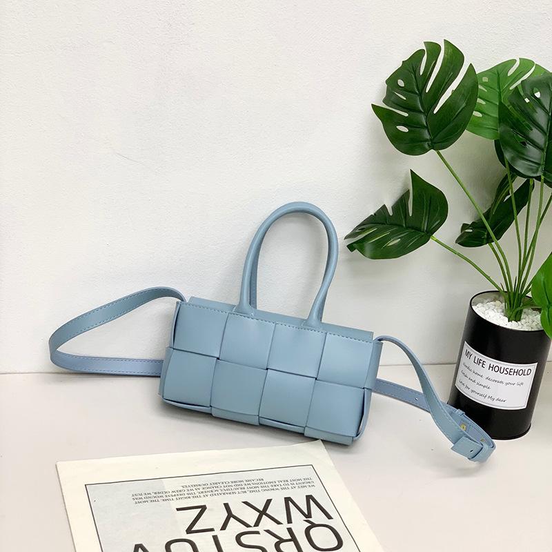 2024 Early spring new leather woven vegetable basket bag women's hand shoulder messenger bag small mini versatile