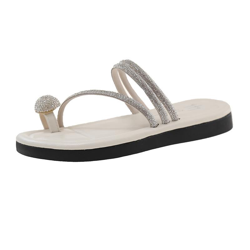 Flat-bottomed cool slippers women's summer wear 2025 new rhinestone fairy wind soft bottom non-slip toe beach one-word drag