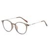 A Pair of Stylish Pochromic Glasses for Women Featuring A Vintage Semi Metal Frame Classic Minimalist Design