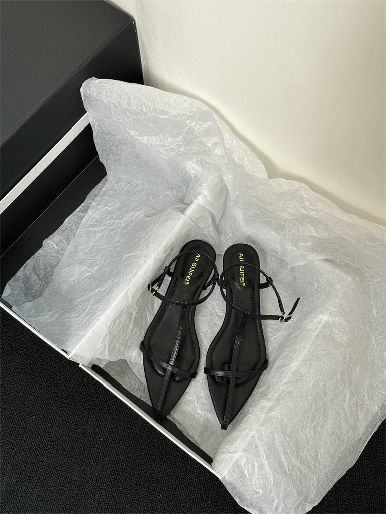 2025 spring and summer Korean version pointed-toed flat-bottomed women's Korean wave heel cross buckle Roman women's shoes design sense sandals women'