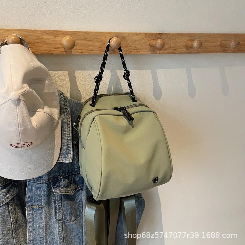 Fashion sense small backpack women's lightweight casual shoulder bag new fashion commuter shell bag simple commuter messenger bag