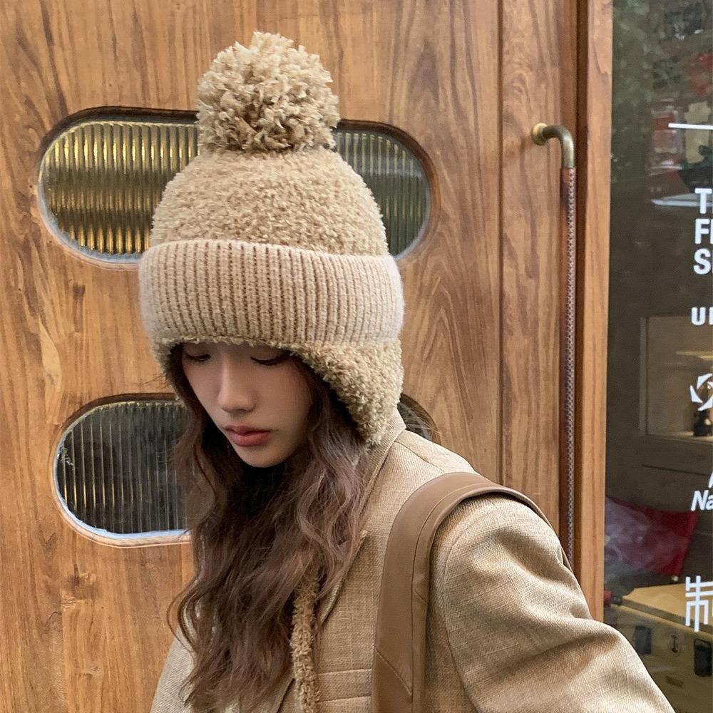 

Cute braid hairball ear protection knitted hat warm thickened wool hat female trend Adult (56-58cm) бежевий