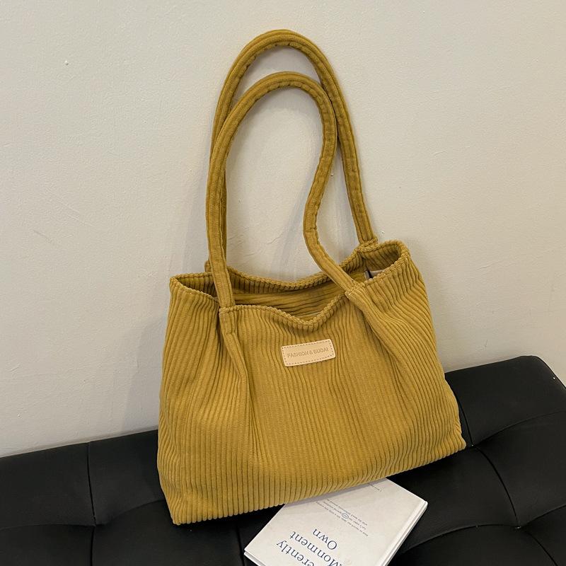 This year's popular fashion Korean version of solid color handbag 2025 early spring new foreign style shoulder underarm bag tote bag women