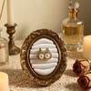 Ring Display Tray with Multiple Horizontal Slots, Ornate Oval Scrollwork Frame and Flat Base for Tabletop Presentation