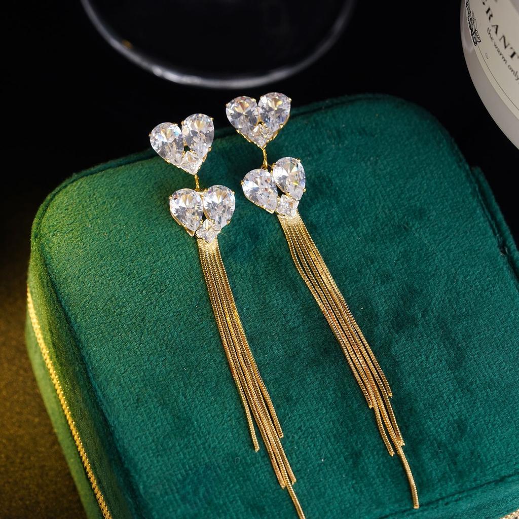 Light luxury, high-end sense, exquisite three zircon love fringed earrings, female temperament, fashionable and versatile, niche design earrings