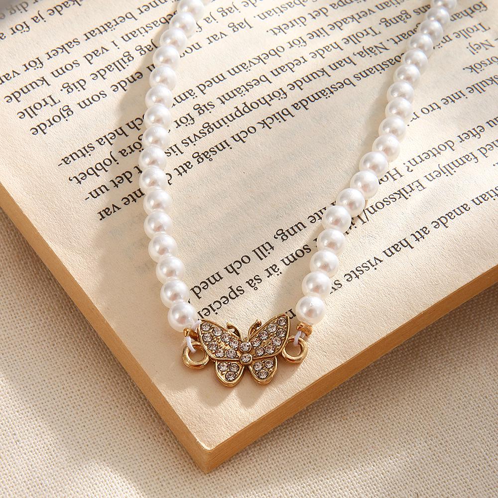 

European & American Style Pearl Butterfly Necklace: Multi-layer Clavicle Chain for Women