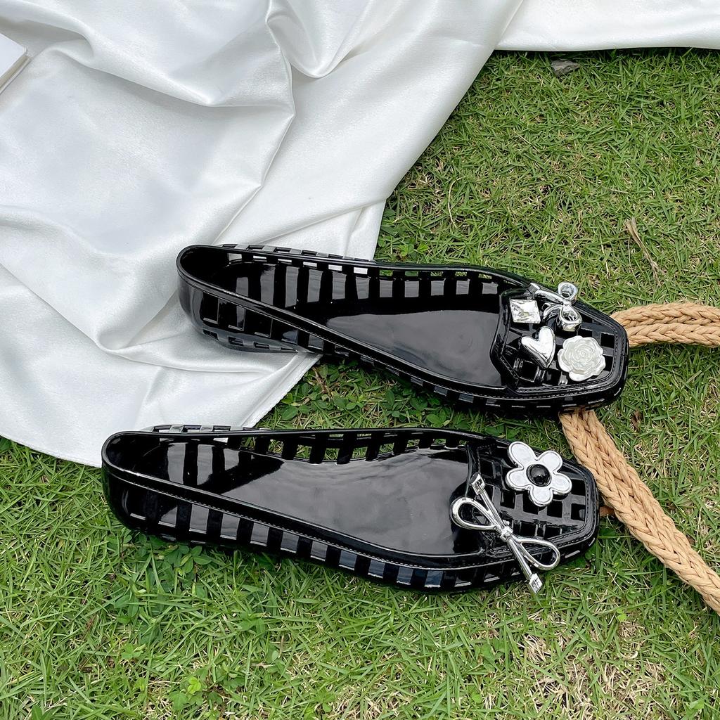 Retro popular black flat-bottomed bag head sandals women's 2025 new summer high-end Korean version crystal jelly shoes