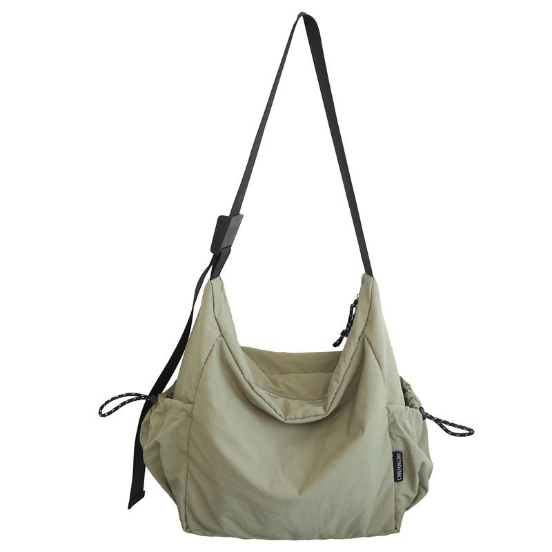 

Містка нейлонова сумка через плече в ретро-стилі - модна та універсальна сумка унісекс One Size зелений