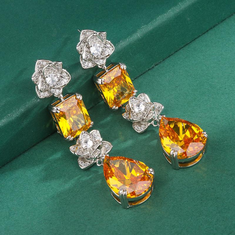 

Ювелирные изделия тяжелой промышленности Банкетный слегка инкрустированный цирконий желтый цветок бахрома капли воды суд рубин жёлтый