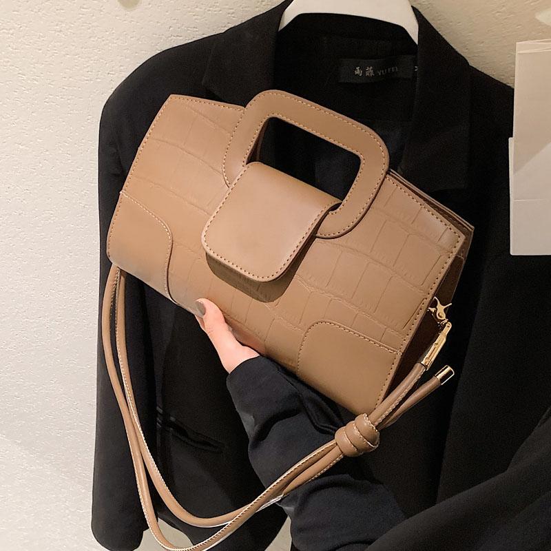 Elegante tekstur damevesker allsidige skulder-crossbody-vesker feminine jobb- og crossbody-pendel-vesker monokrome og retro nye