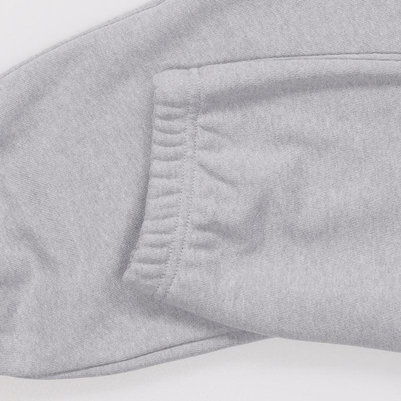Under Armour Pantalon d'entraînement en maille de coton épais à lacets avec imprimé de lettres de dessin animé pour femme Gris 1379831-011