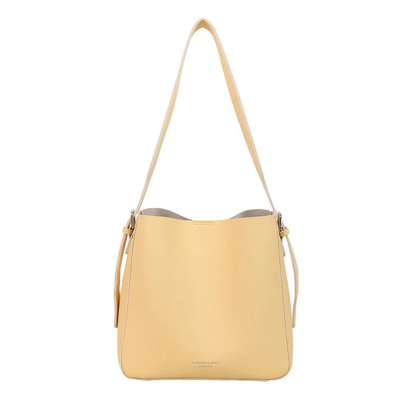 

Сегодняшние популярные маленькие сумки для женщин, новые универсальные нишевые весенне-летние сумки через плечо и мессенджеры, модные сумки-ведра жёлтый