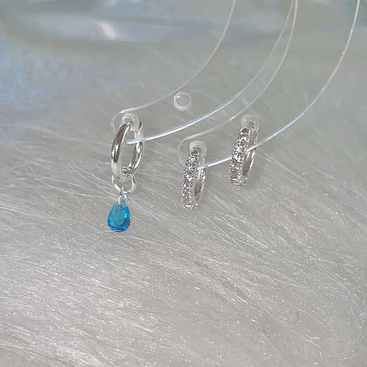 

Niche high-end sense asymmetrical lake blue water drop zircon earrings women s simple and versatile fashion suit small earrings copper