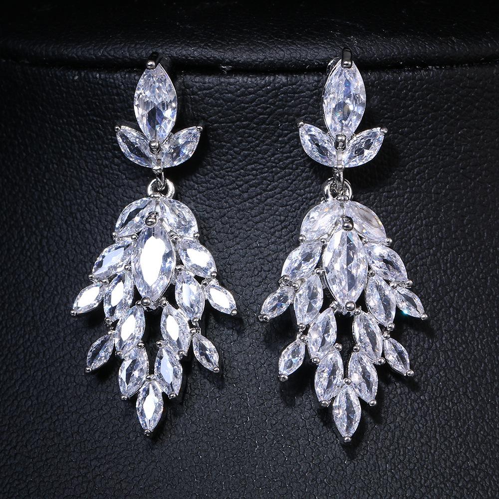 

Silver Zircon Leaf Earrings: Luxurious, Shimmering Women s Fashion Design