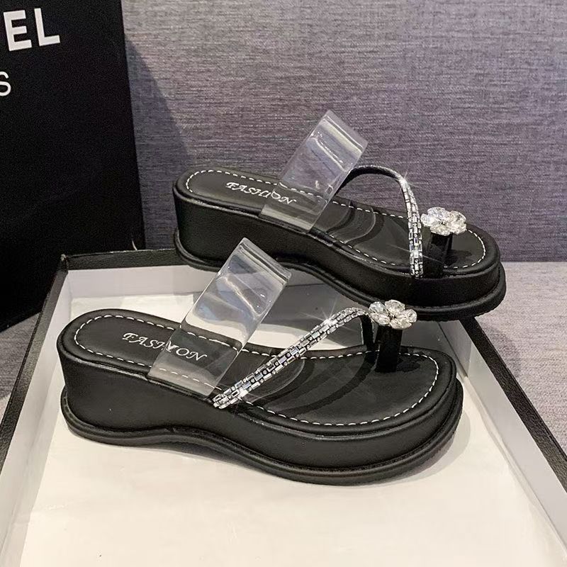 2025 sommar nya franska fantastiska muffin tjockbottnade strass täckta tå tofflor, high-end kjolsandaler