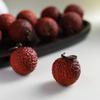 Purple Sandalwood Lychee Wenwan Handheld Ornament: Agarwood Craft for Office Tea Table.