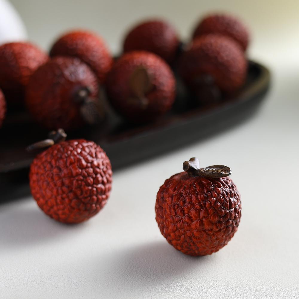 Purple Sandalwood Lychee Wenwan Handheld Ornament: Agarwood Craft for Office Tea Table.