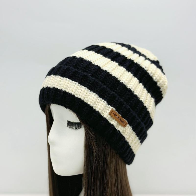 

Autumn and winter women s wool hat knitted hat two-color with classic versatile thermal ear protection street style show face idyllic style one size fits all чёрный