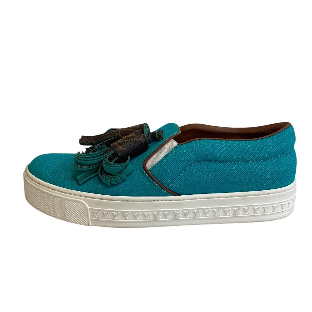 LOUIS VUITTON Turquoise tassel slip-on sneakers Destination canvas sneakers Turquoise canvas Women Used