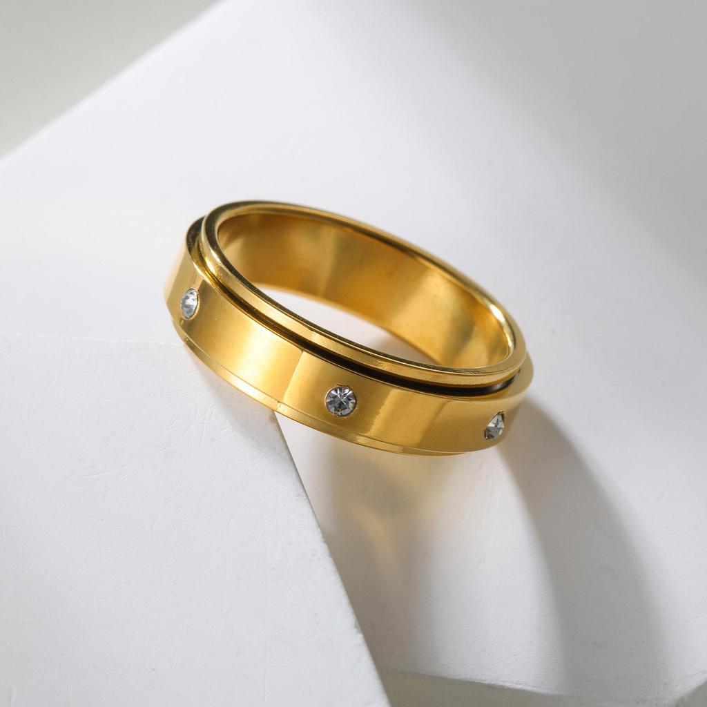 European and American Luxury Six-Diamond Rotating Stainless Steel Gold Ring with Micro-Paved Design