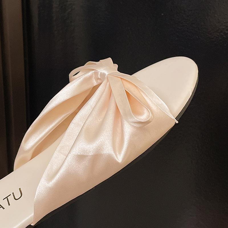 Korean version of fairy style elegant cool slippers 2025 new wear soft-soled bow shoes flat beach open toe cool