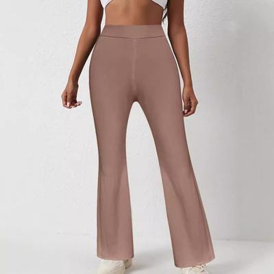 Damskie spodnie z szerokimi nogawkami bootcut elastyczne z wysokim stanem jednokolorowe prążkowane spodnie jednokolorowy design spodnie rozszerzane