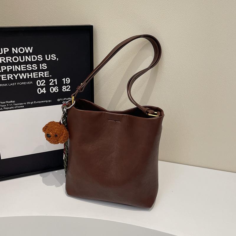 

Трендовые женские сумки 2025 зима новые сумки-ведра простые сумки-тоут большой вместимости 25*12*27