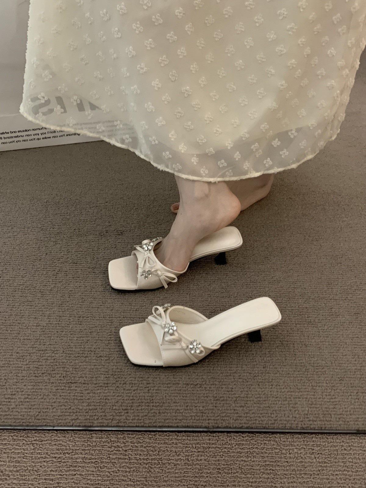 

French fairy style high-end stiletto slippers female summer wear 2025 summer soft-soled travel exquisite sandals 40