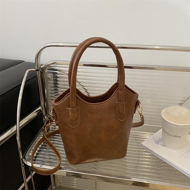 

Fashion retro messenger tote bag women s bag 2025 solid color hand carry square bag shoulder bucket bag