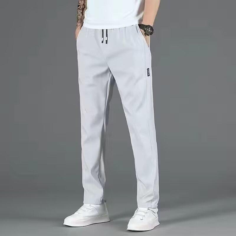 Summer new men's breathable elastic casual pants loose fashion comfortable trend straight sports long pants