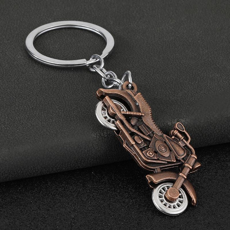 Klíčenka s motocyklovým kolem: Simulovaná pohyblivá ozdoba