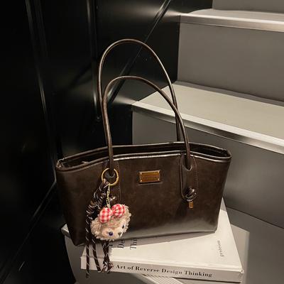 Herbst und Winter neue High-End-Textur Retro Nischen-Tasche Damen College-Studentin Pendeln Schulter-Tragetasche
