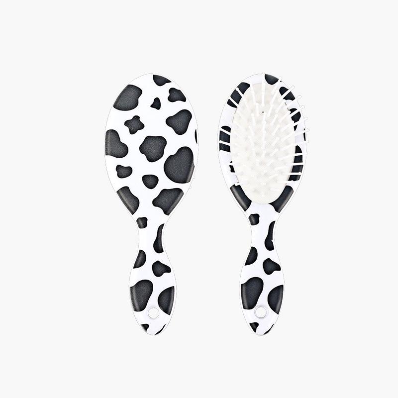 

Cute Dual-Use Hair Brush: Straighten, Curl & Smooth with Cartoon Cow Design - Portable Oval Air Cushion Massage.