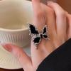 Schwarzer Schmetterlings-Eisenknochen-Spaß übertriebener verstellbarer Ring