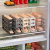 La boîte de rangement pour œufs de réfrigérateur peut contenir plusieurs œufs, les gardant rangés et faciles d'accès. Convient pour une utilisation en cuisine.