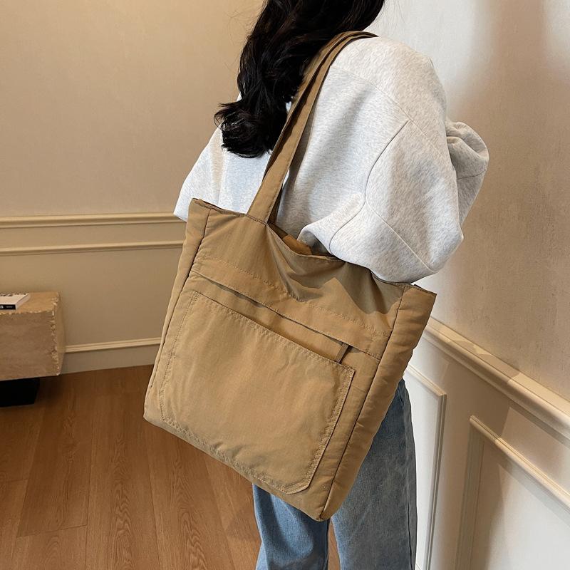 Solid color versatile casual shoulder bag large capacity simple texture tote bag fashionable commuter art bag