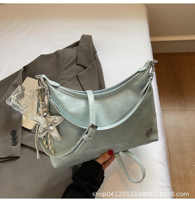 

Korean version of high-end texture fashionable versatile shoulder underarm bag women s 2025 summer new messenger commuter tote bag синий