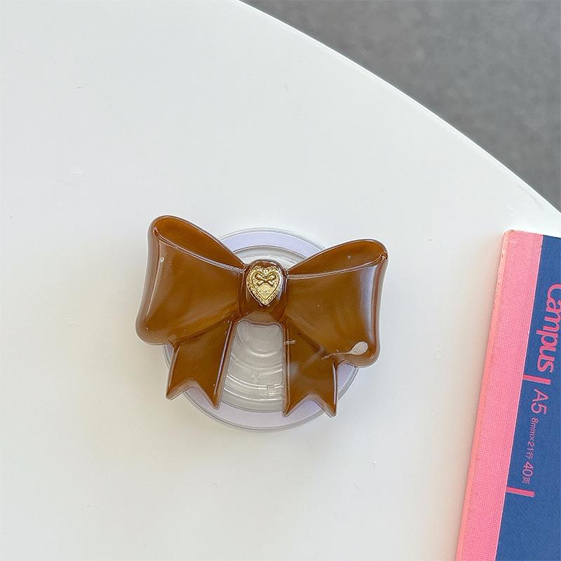 Small Love Three-Dimensional Bow Mobile Phone Airbag Bracket Magnetic Suction Telescopic Folding Desktop Bracket Wind