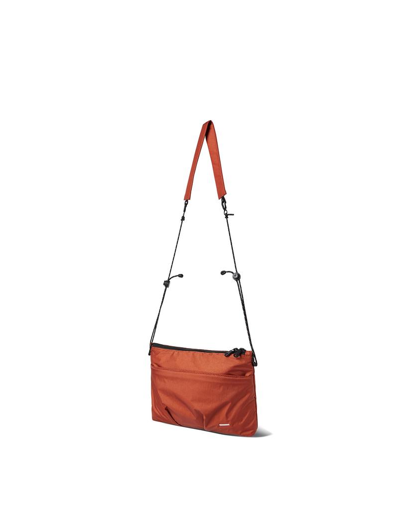 Worthwhile Movement Pleated Sacoche Bag (Orange)