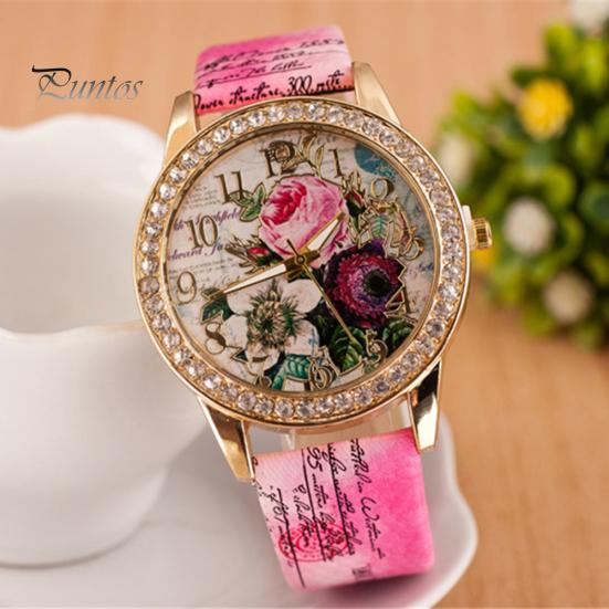Orologio da polso da donna al quarzo con quadrante rotondo intarsiato di strass a forma di fiore e cinturino in ecopelle
