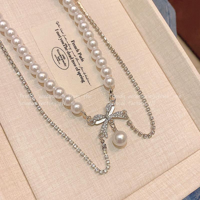 Xiaoxiangfeng French pearl necklace women's double-layer bow collarbone chain fashionable versatile neck chain with