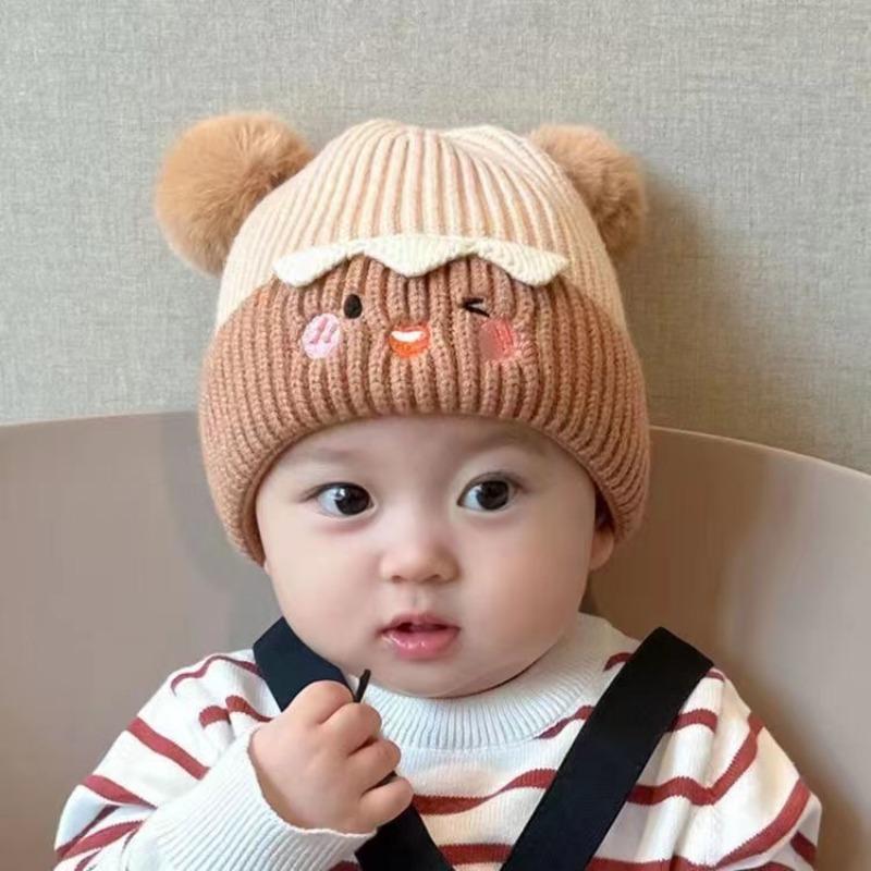 Baby autumn and winter cute cartoon warm hairball wool hat boys and girls baby ear protection hat children pullover knitted hat