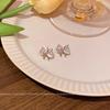 Korean version in wind zircon bow earrings women's personality hollow stud earrings new temperament ears