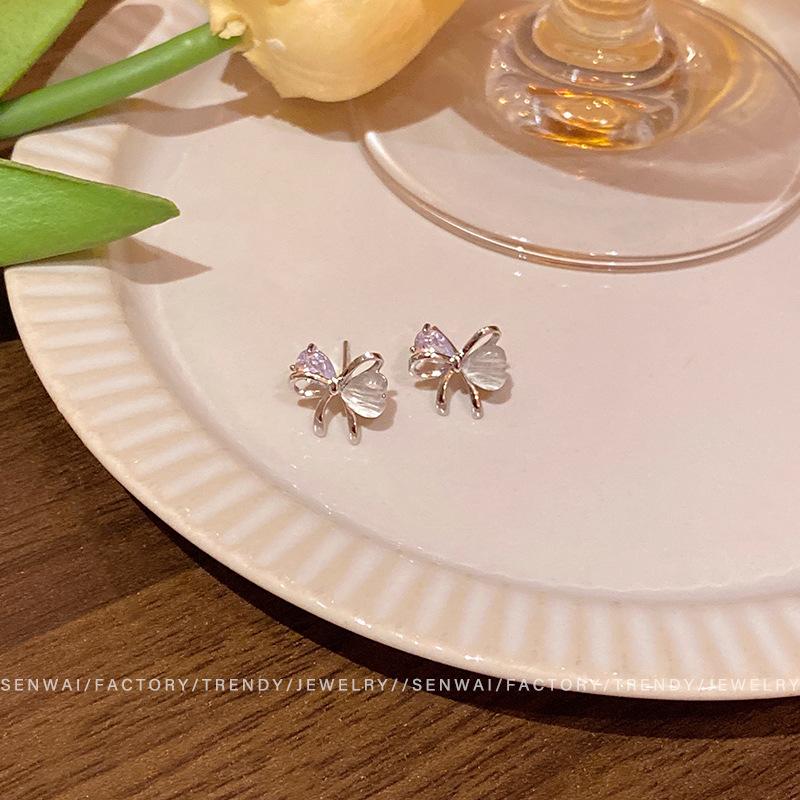 Korean version in wind zircon bow earrings women's personality hollow stud earrings new temperament ears