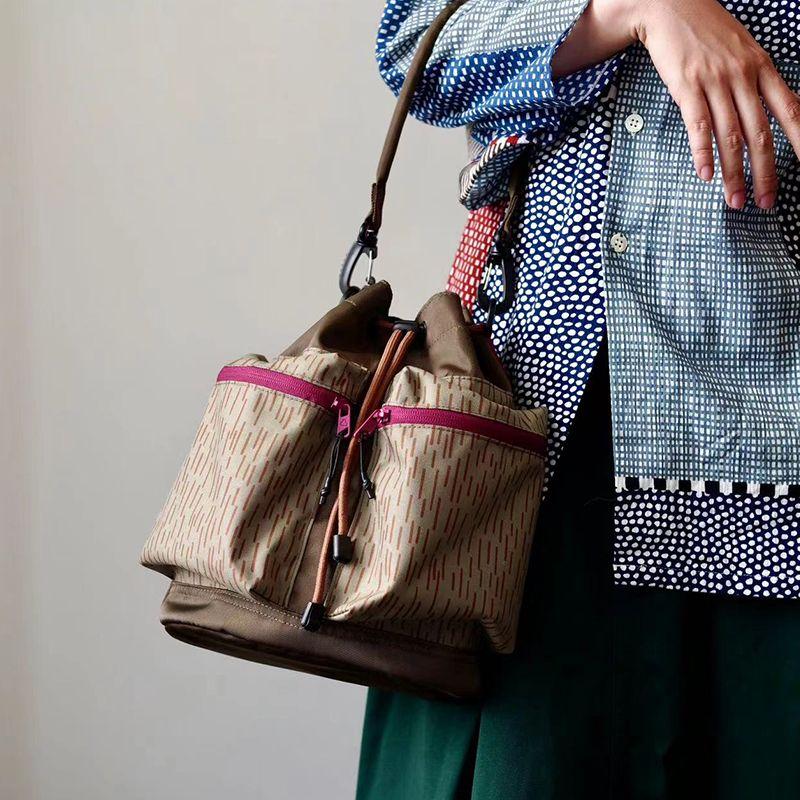 

Original Camping Patchwork Multi-Pocket Lightweight Crossbody Bag Raindrop pattern